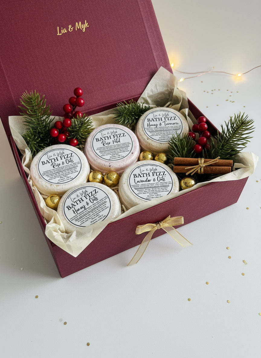 4 bath bombs in a Christmas gifts box and Christmas gift background